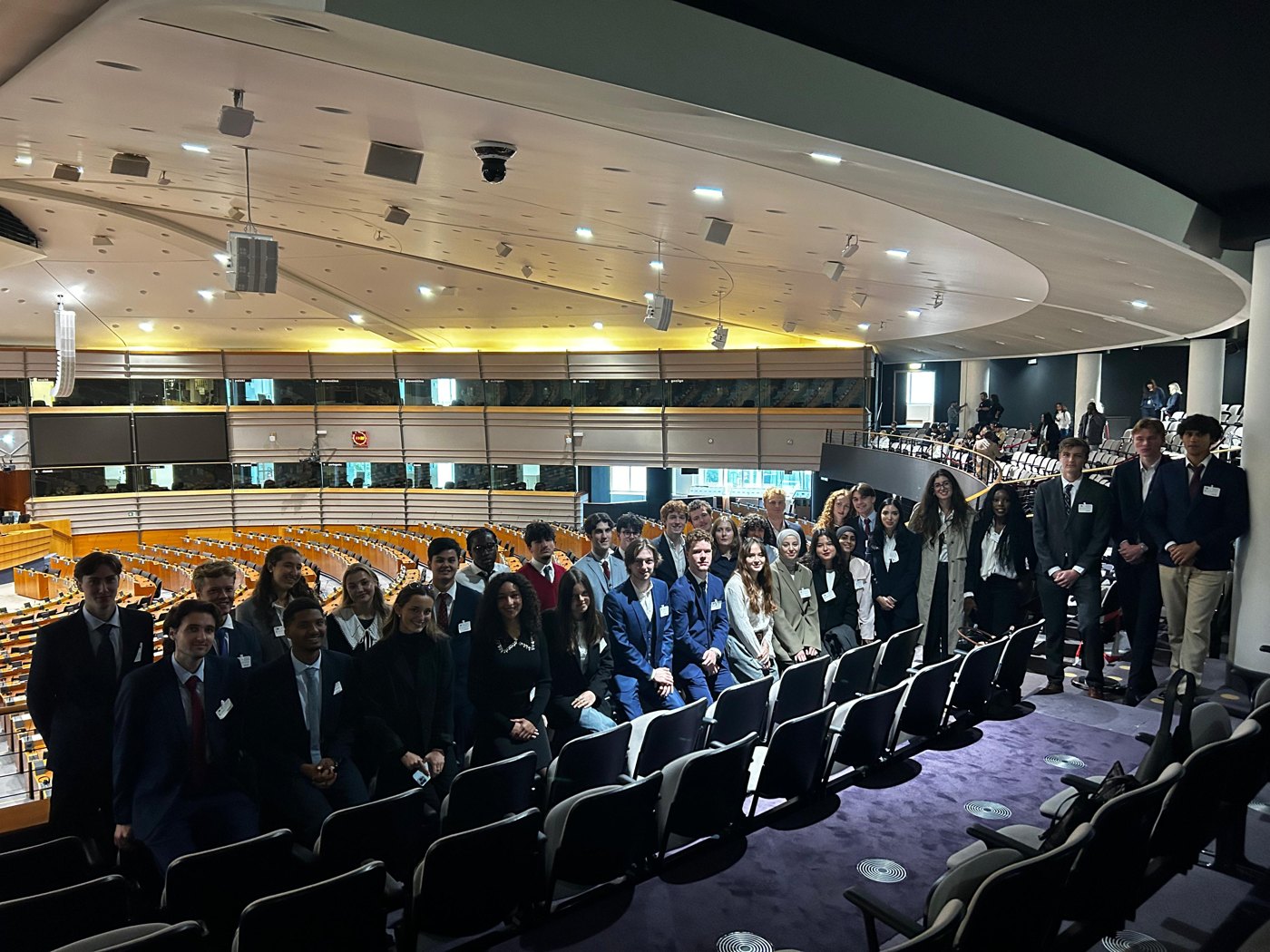 BrusselsMUN delegates inside the European Parliament hemicycle